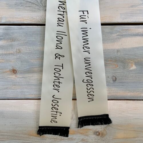 Trauerschleife in weiß bedruckt